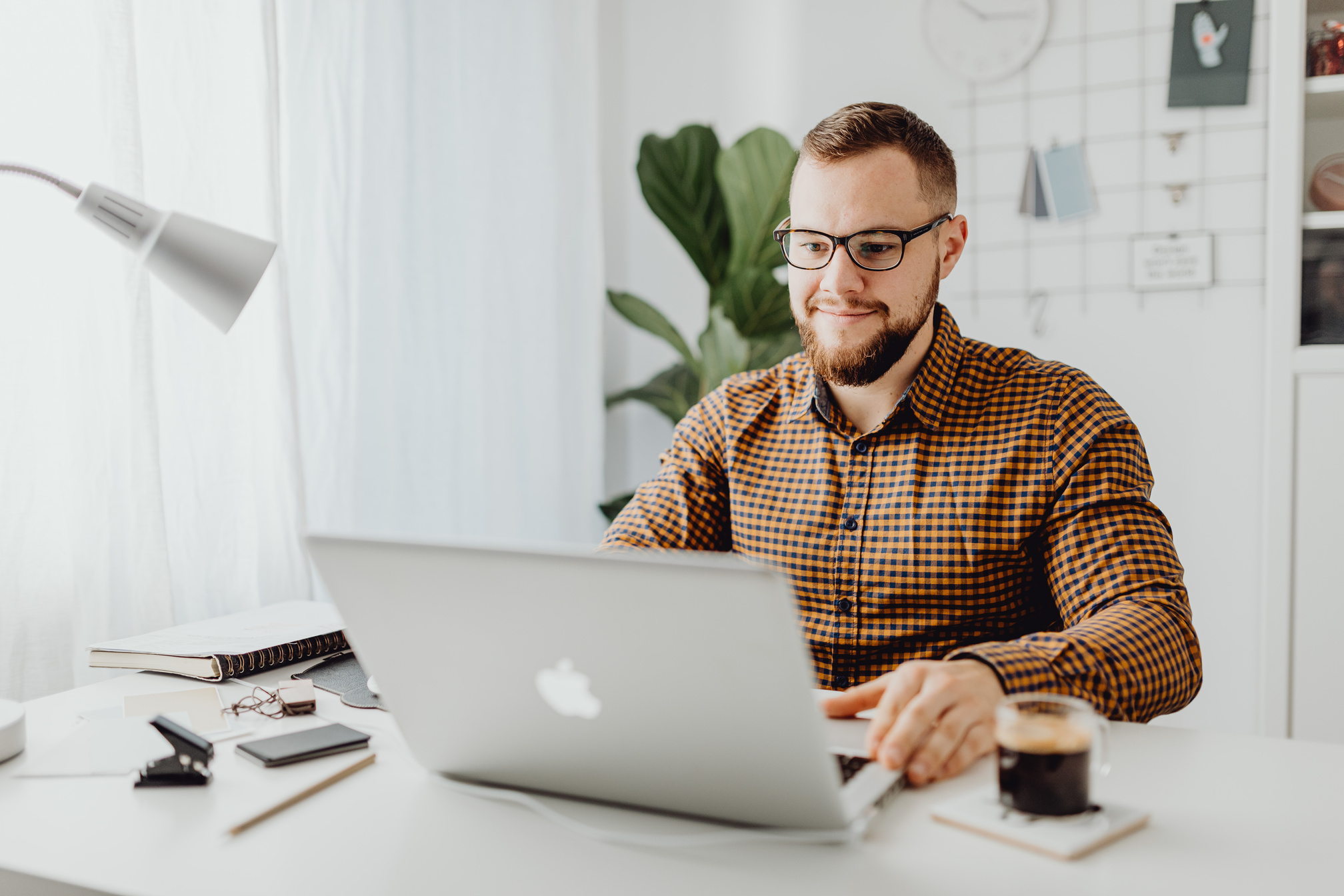 Man Working with Laptop in Office